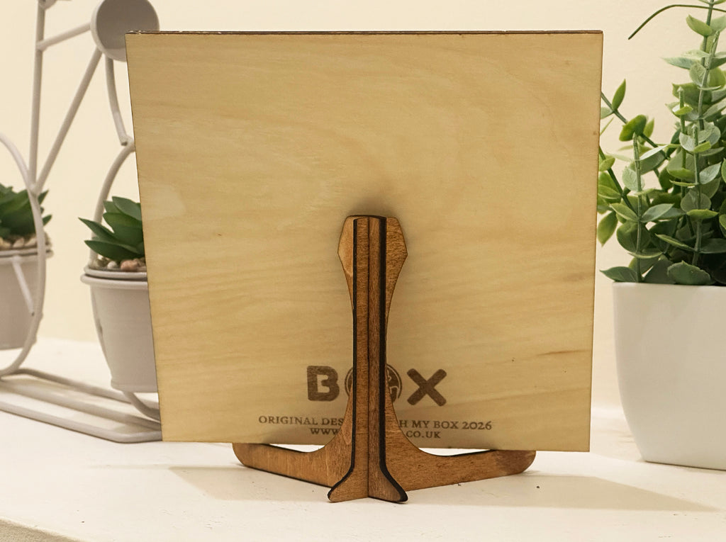 Wooden product with 'Oh My Box' branding on a light background