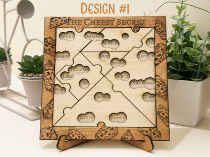 Pregnancy Announcement Wooden puzzle with baby reveal riddle surrounded by plants.