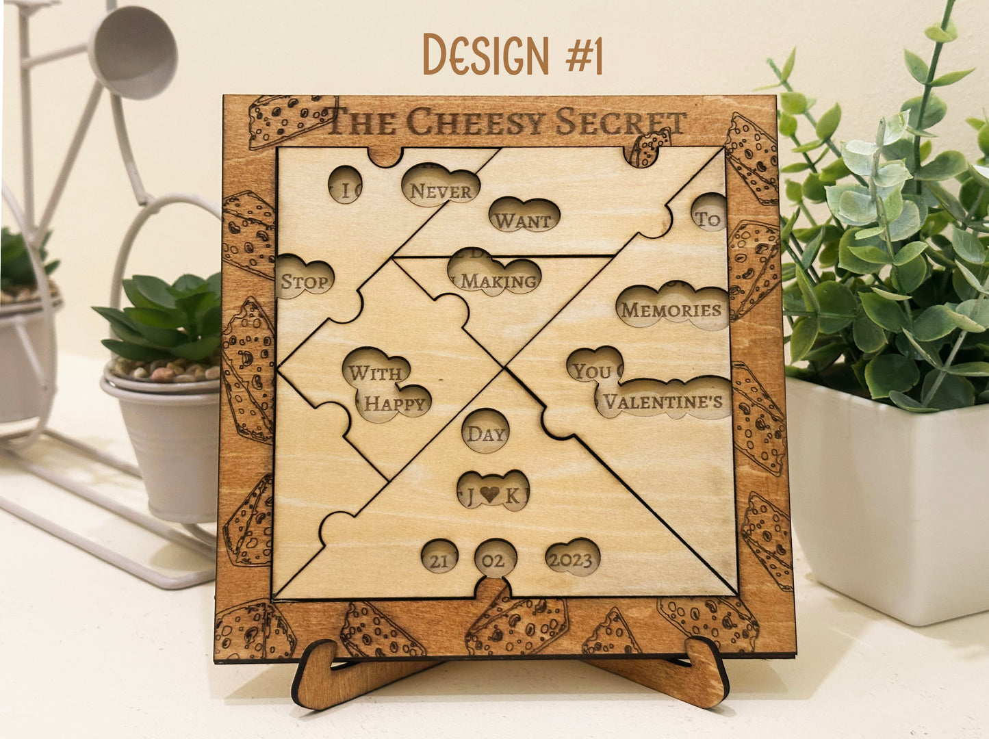Valentine's day Wooden puzzle with engraved text on a stand, surrounded by plants.